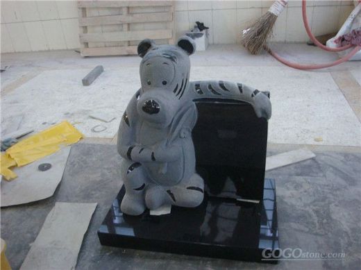 Child granite headstone with animal
