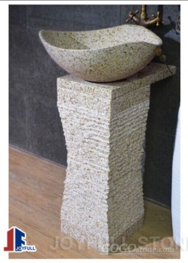 Black marble pedestal sink and basin