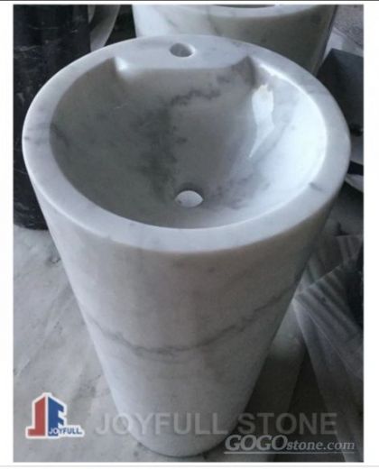 white marble pedestal sink