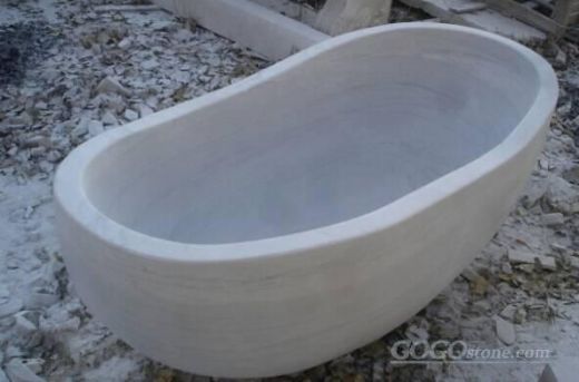 white stone bath tub