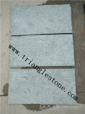 Green stone tiles for pool paving